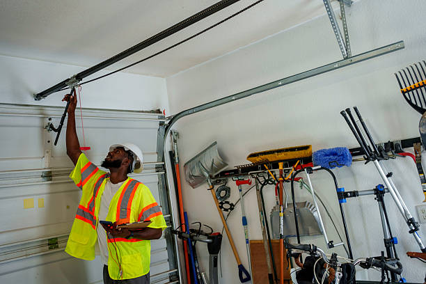 Professional Garage Door Panel Replacement technician working in Olyphant, PA